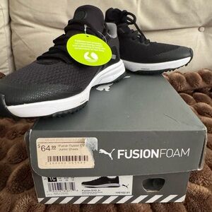 Puma Kids Black Fusion EVO spikeless golf shoes.